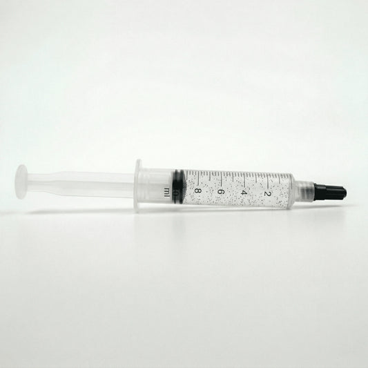P. Cubensis Spore syringe on a white background